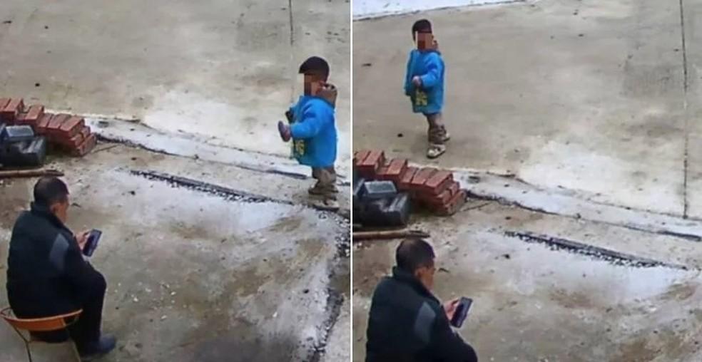 Homem se distrai com celular e neto morre afogado em rio na China Foto Reproduo